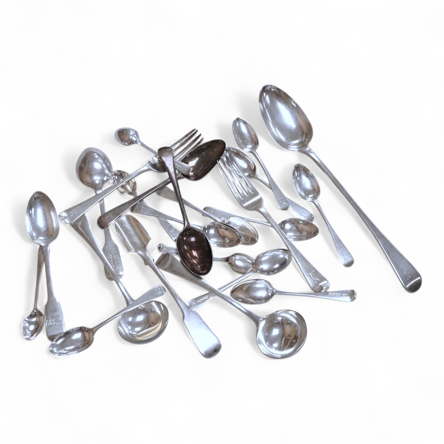 A small quantity of assorted 19th century silver flatware, various patterns, dates and makers, including a set of nine Old English pattern teaspoons, William Chawner II, London, 1833, an Old English pattern basting spoon